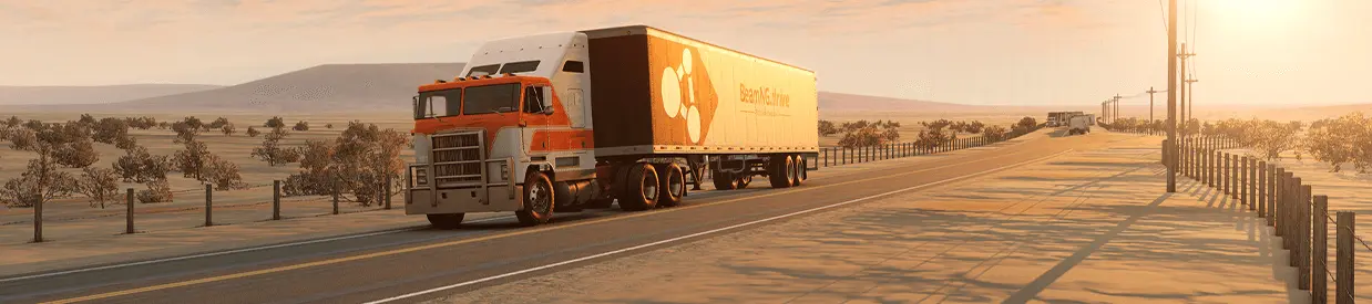 An orange BeamNG.drive truck crossing a desert highway